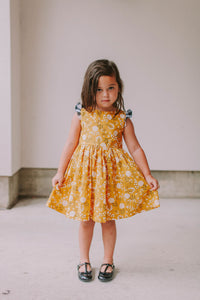 Little Girl's Yellow Floral Twirl Dress with Contrasting Flutter Sleeves