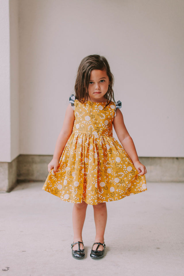 Little Girl's Yellow Floral Twirl Dress with Contrasting Flutter Sleeves