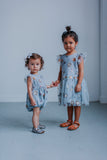 little girls matching gray outfits 