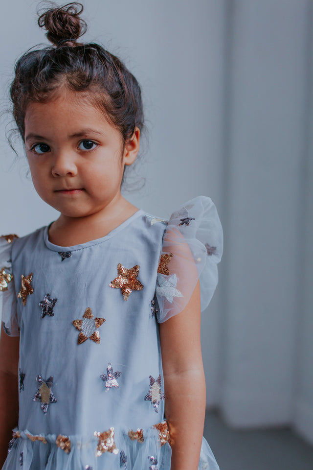 Girls star dress clearance