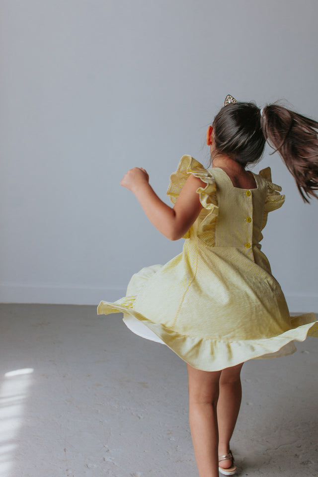 little girls yellow Belle dress
