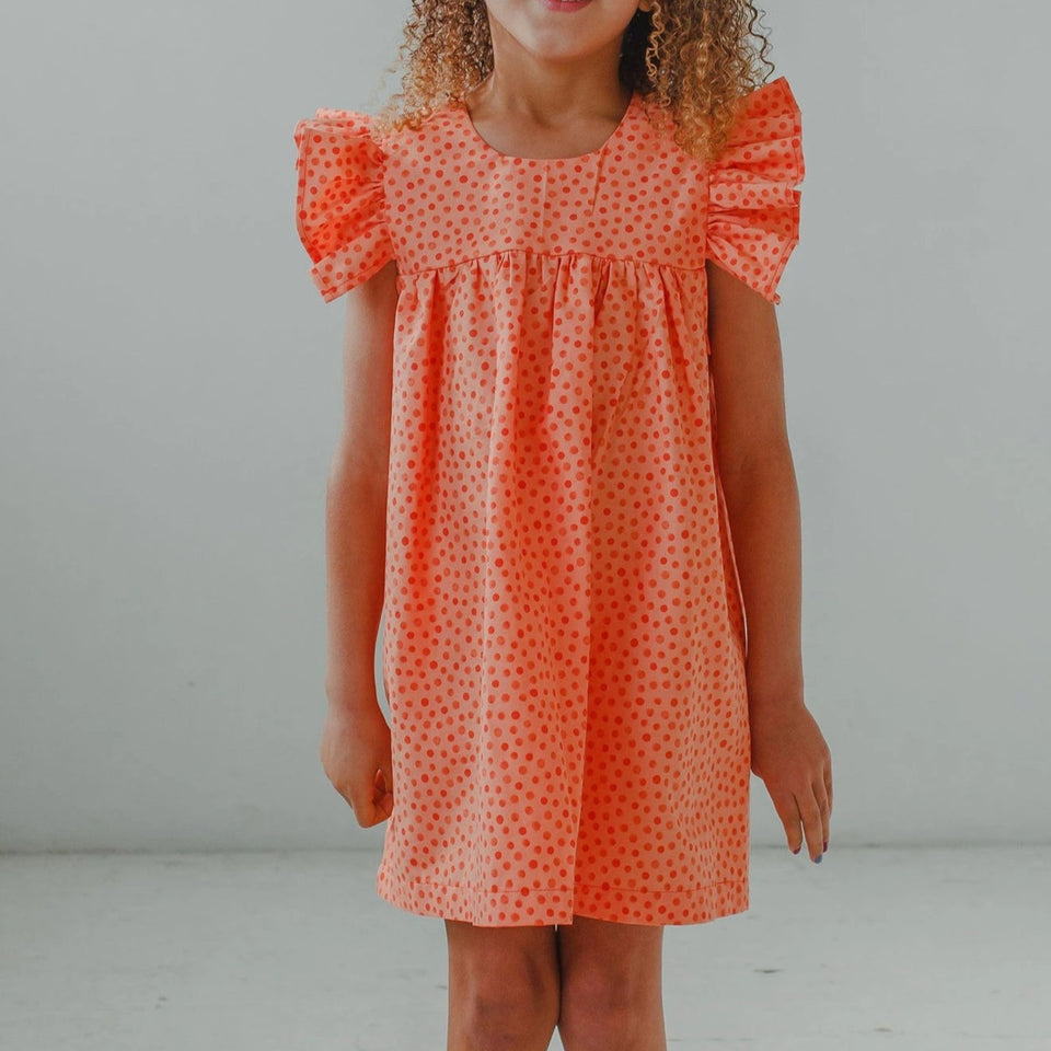 little girl's orange ruffle dress