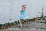 Little Girl's Blue Gingham Pinafore Dress with Pom Pom Trim